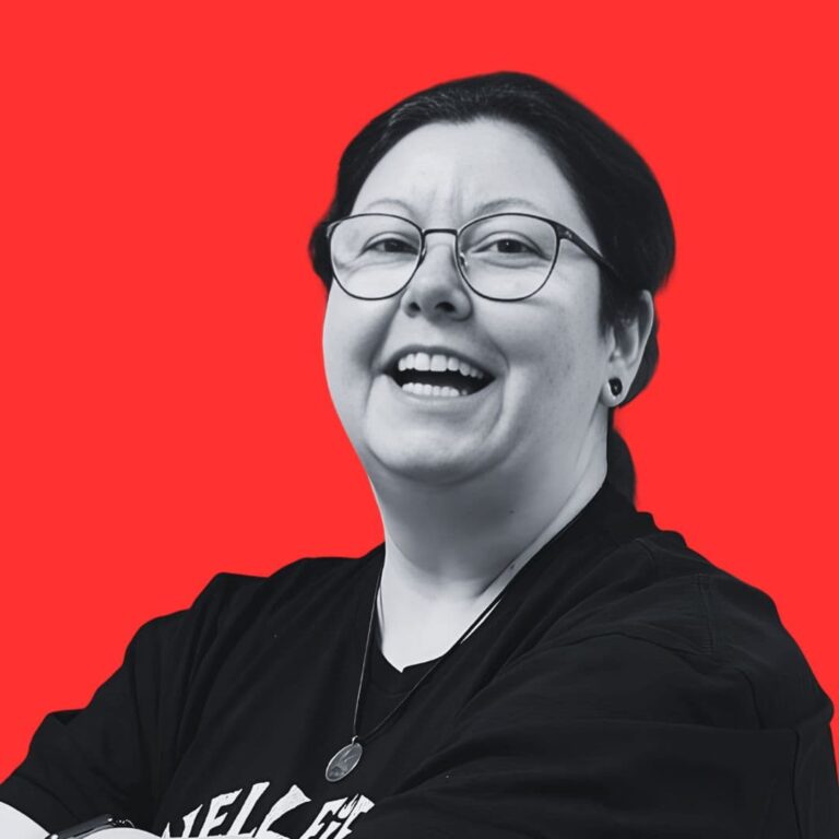 Smiling person on a red background